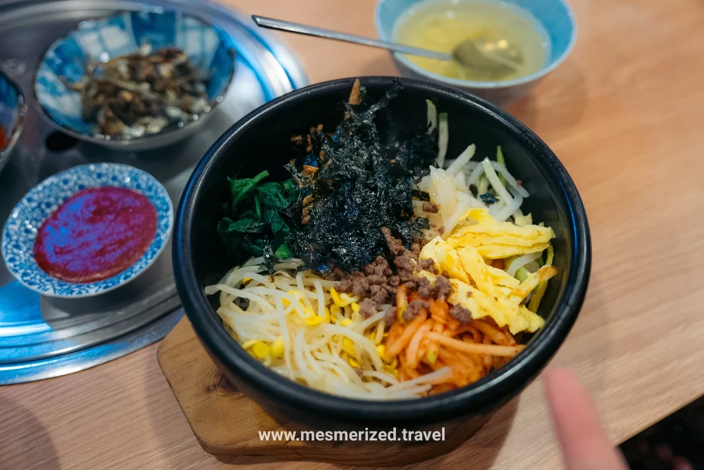 Bibimbap rice bowl with vegetables and meat